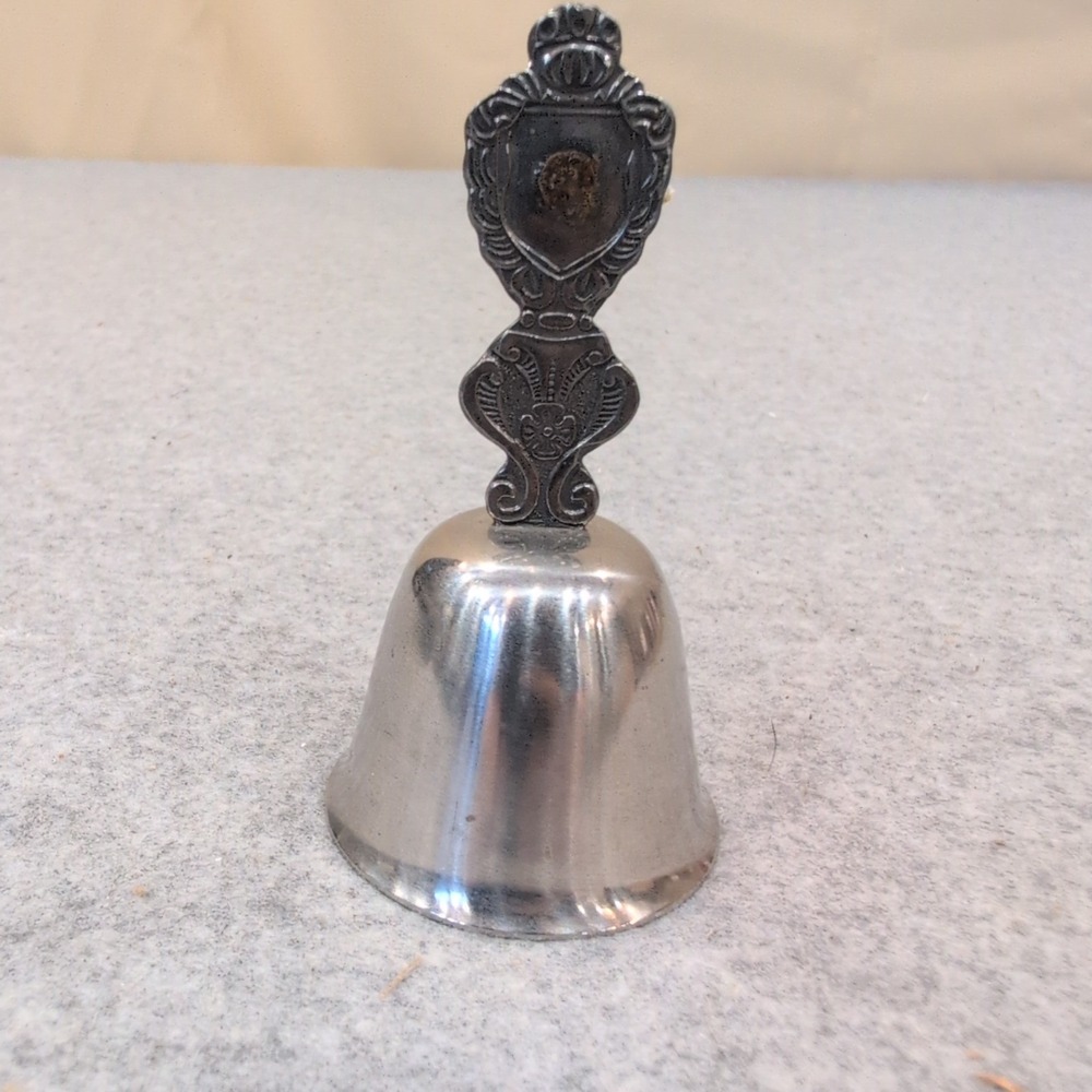 Vintage Silver Tone Ornate Crest Shield Hand Bell Decorative Service Bell - Picture 1 of 4
